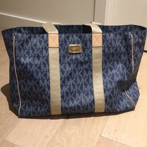 Like new Michael Kors blue logo travel bag